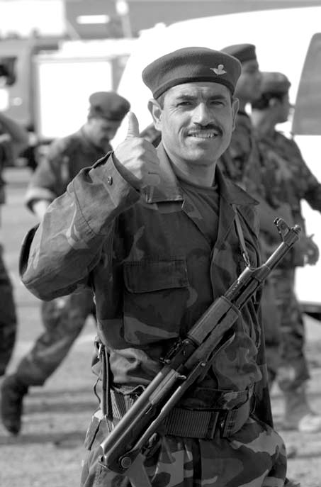 An Iraqi public order brigade soldier after graduating from the police academy in the Muthana Zayuna District of Baghdad, Iraq, 9 January 2006.